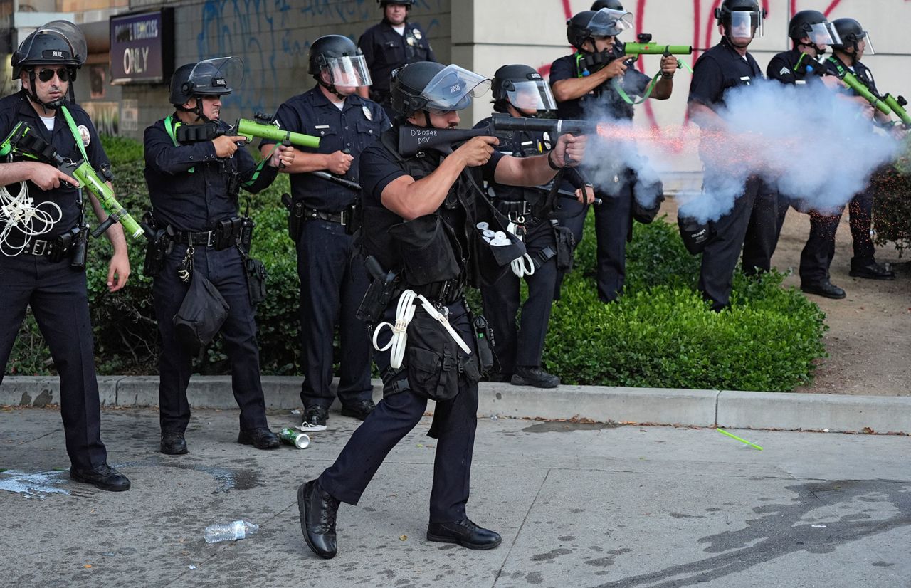 Los Angeles police department personnel fire non-lethal rounds at protesters on Monday, June 9, 2025, in downtown Los Angeles. (AP Photo Jae Hong)