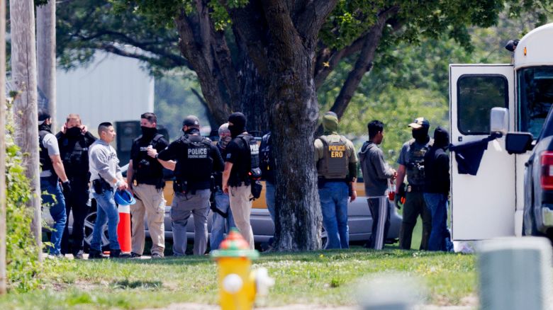 Federal agents are seen near Glenn Valley Foods in Omaha, Neb., Tuesday, June 10, 2025. (Nikos Frazier/Omaha World-Herald via AP)