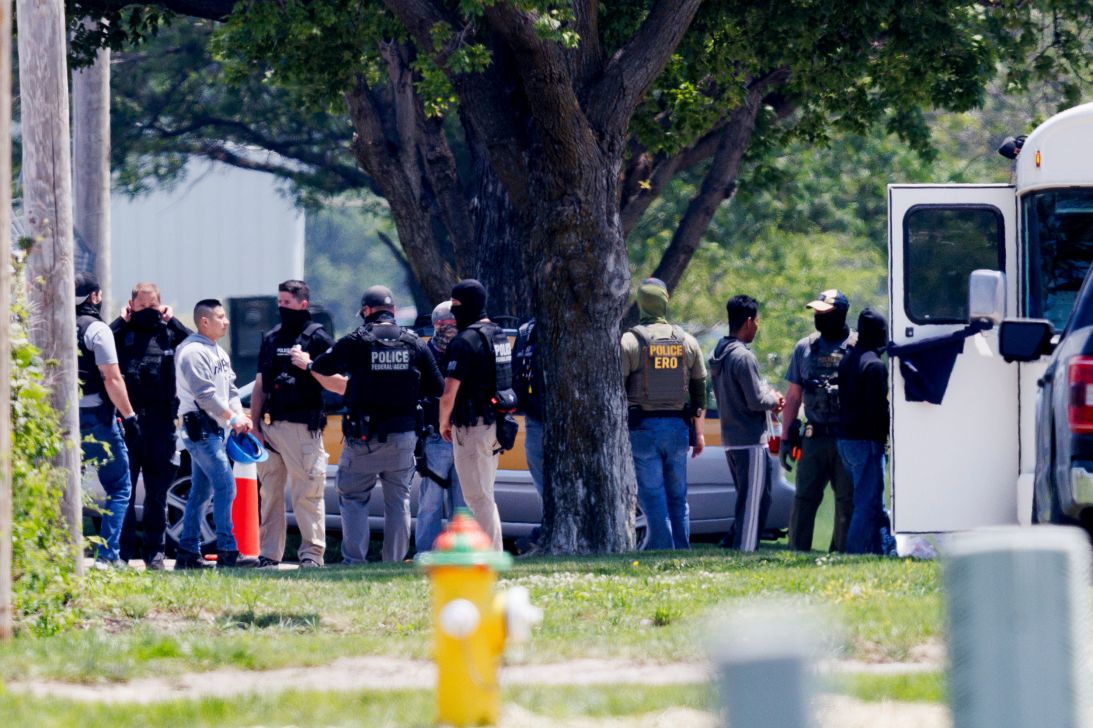 Federal agents are seen near Glenn Valley Foods in Omaha, Nebraska, on the day of the raid that detained dozens of workers.