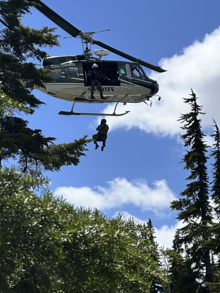 Law enforcement officers searched extensively for the fugitive father, including by helicopter as seen here in a handout photo from June 6.