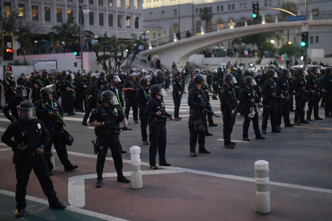 Police block a street during a protest on June 10 in Los Angeles.