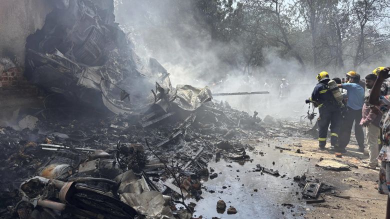 Firefighters work at the site of an airplane that crashed in India's northwestern city of Ahmedabad in Gujarat state, Thursday, June12, 2025. (AP Photo/Ajit Solanki)