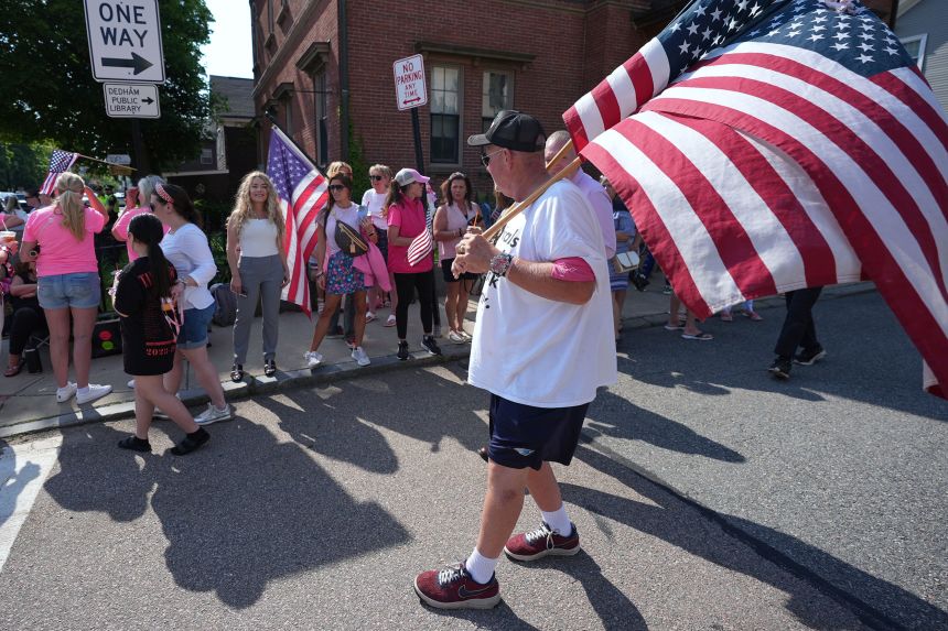 Karen Reid's supporters Norfolk gather outside the Superior Court before the day session, on Thursday, June 12, 2025 in Deadam, Mass. (AP Photo/Charles Krupa)
