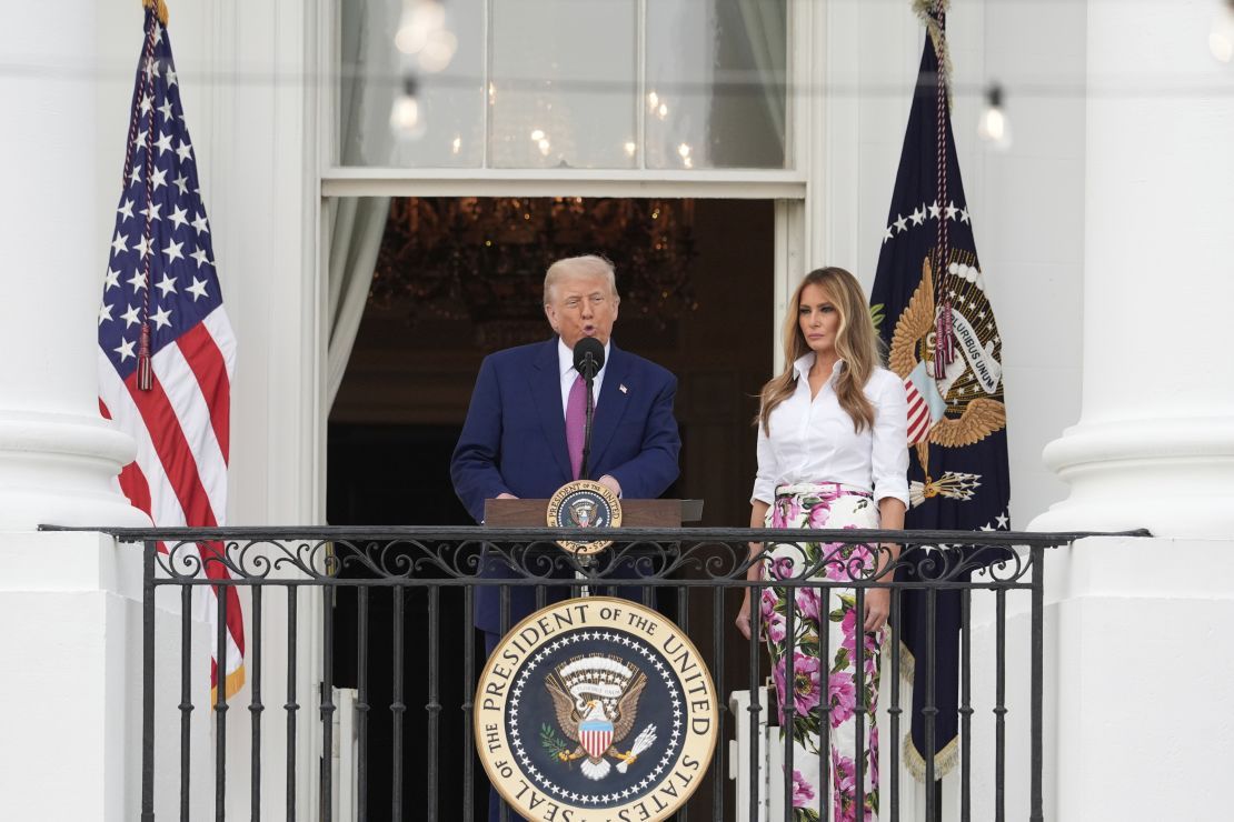 President Donald Trump speaks as first lady Melania Trump listens during the congressional picnic on the South Lawn of the White House on Thursday, June 12, 2025, in Washington.