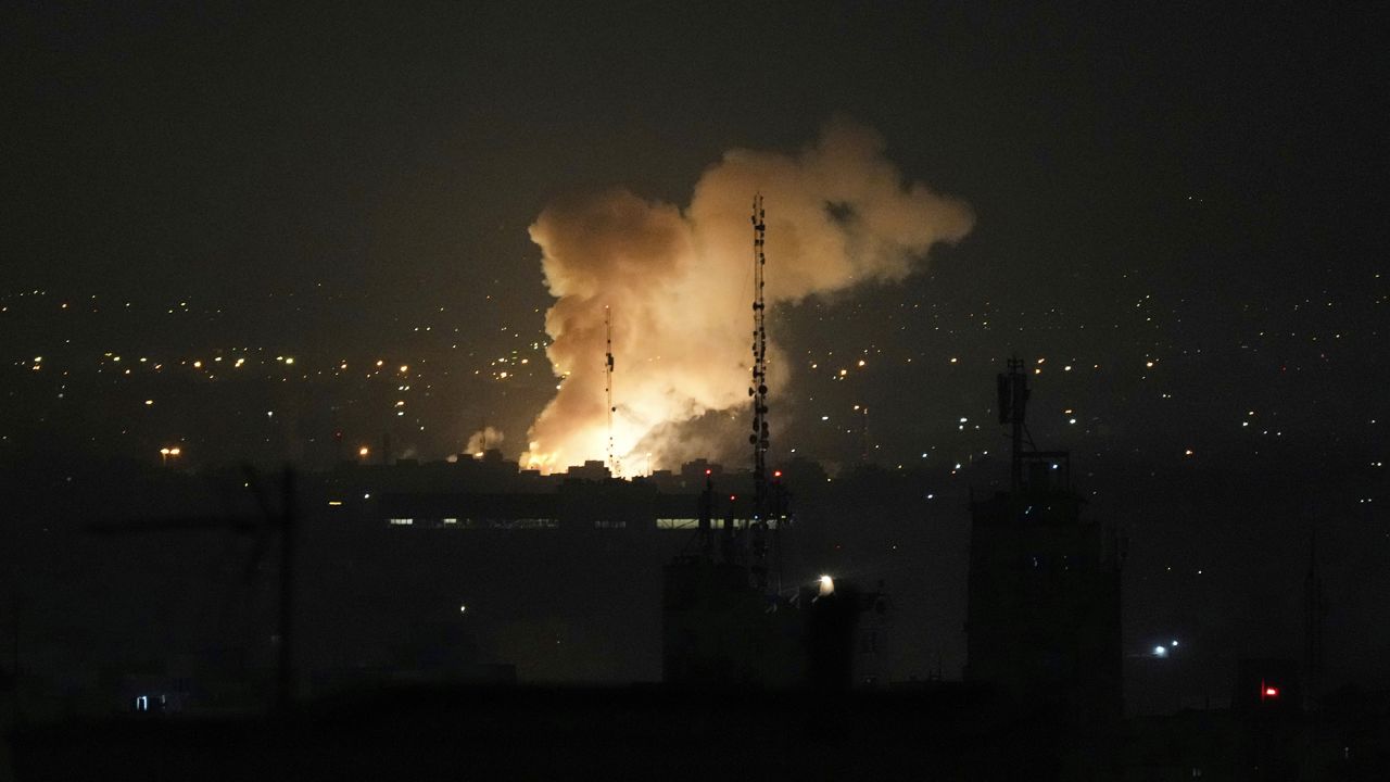 Smoke rises up after an explosion in Tehran, Iran, Friday, June 13, 2025.