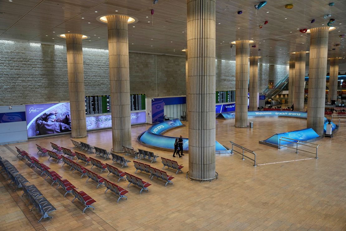 Israel's Ben Gurion Airport is empty of passengers on Friday after all flights were canceled.