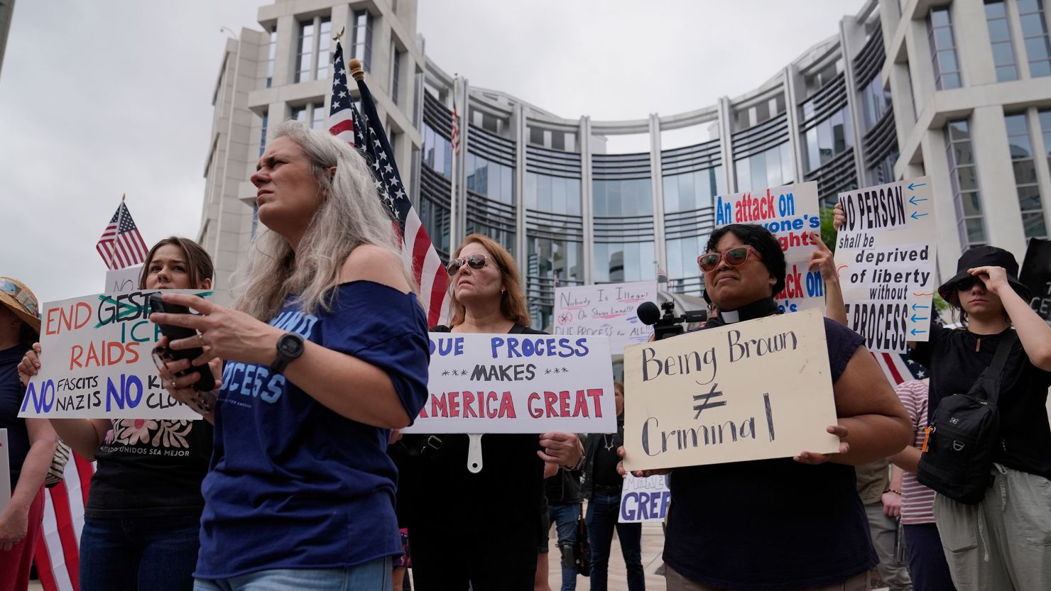 Protesters gather outside the Federal Courthouse before arguments about whether Kilmar Abrego Garcia can be released from jail on Friday, June 13, 2025 in Nashville, Tenn. (AP Photo/George Walker IV)