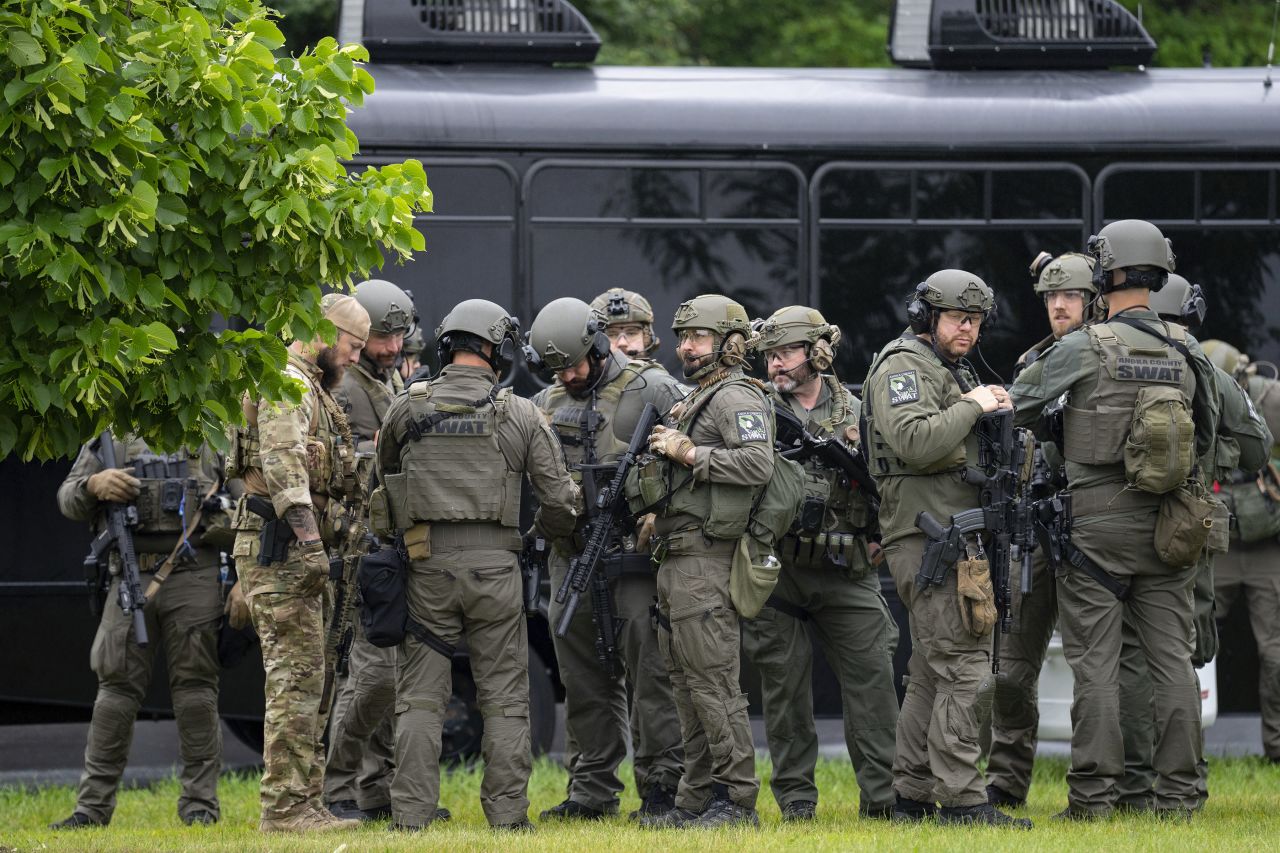Law enforcement officers are deployed in Brooklyn Park, Minnesota, on Saturday.