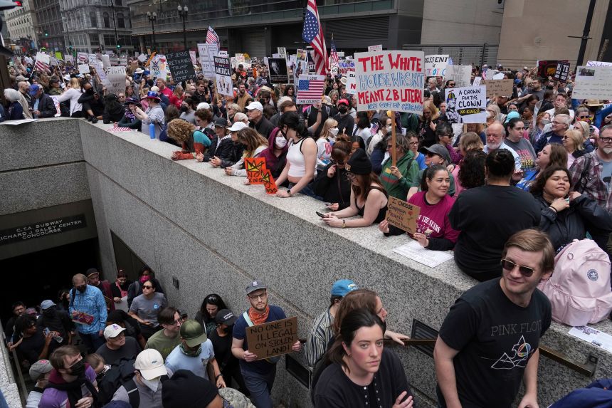 Demonstrators take part in the 