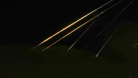 Traces of projectile illuminates the sky seen from northern Israel, Saturday, June 14, 2025. (AP Photo/Ariel Schalit)