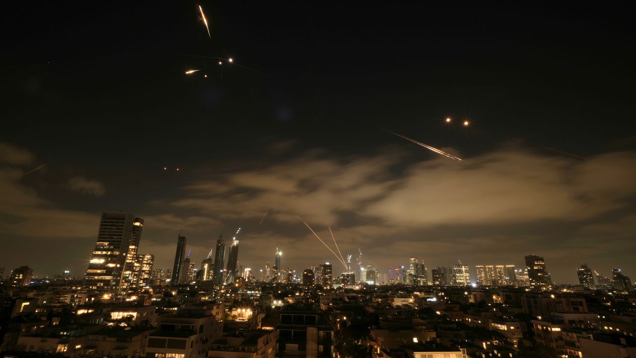 The Israeli Iron Dome air defense system fires to intercept missiles over Tel Aviv, Israel, Sunday, June 15, 2025.