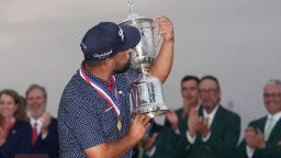 J.J. Spaun celebrates with the trophy after winning the U.S. Open golf tournament at Oakmont Country Club Sunday, June 15, 2025, in Oakmont, Pa. (AP Photo/Seth Wenig)