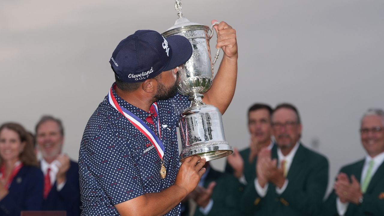 J.J. Spaun celebrates with the trophy after winning the U.S. Open golf tournament at Oakmont Country Club Sunday, June 15, 2025, in Oakmont, Pa. (AP Photo/Seth Wenig)