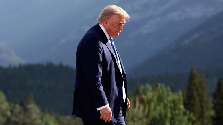 U.S. President Donald Trump leaves after a family photo session during the G7 Summit, in Kananaskis, Alberta, Monday, June 16, 2025. (Suzanne Plunkett/Pool Photo via AP)