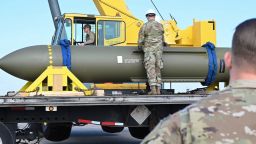  In this photo released by the US Air Force on May 2, 2023, airmen look at a GBU-57, known as the Massive Ordnance Penetrator, at Whiteman Air Base in Missouri.