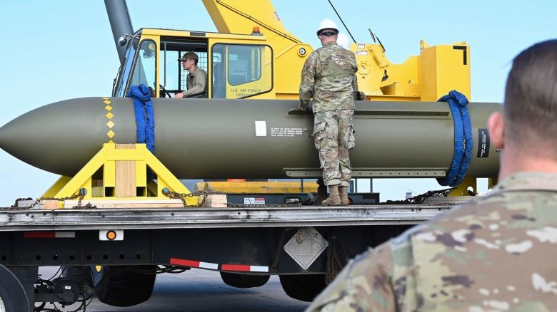  In this photo released by the US Air Force on May 2, 2023, airmen look at a GBU-57, known as the Massive Ordnance Penetrator, at Whiteman Air Base in Missouri.