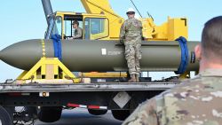 In this photo released by the US Air Force on May 2, 2023, airmen look at a GBU-57, known as the Massive Ordnance Penetrator, at Whiteman Air Base in Missouri.