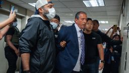 New York City Comptroller Brad Lander is placed under arrest by Immigration and Customs Enforcement (ICE) and FBI agents outside federal immigration court on Tuesday in New York. (AP Photo/Olga Fedorova)