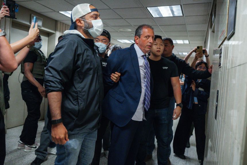 New York City Comptroller Brad Lander is placed under arrest by masked Immigration and Customs Enforcement and FBI agents outside federal immigration court on Tuesday in New York. (AP Photo/Olga Fedorova)