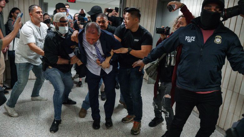 New York City Comptroller Brad Lander is placed under arrest by Immigration and Customs Enforcement and FBI agents outside federal immigration court in New York, on Tuesday, June 17, 2025.