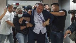 New York City Comptroller Brad Lander is placed under arrest by Immigration and Customs Enforcement (ICE) and FBI agents outside federal immigration court on Tuesday, June 17, 2025, in New York. (AP Photo/Olga Fedorova)