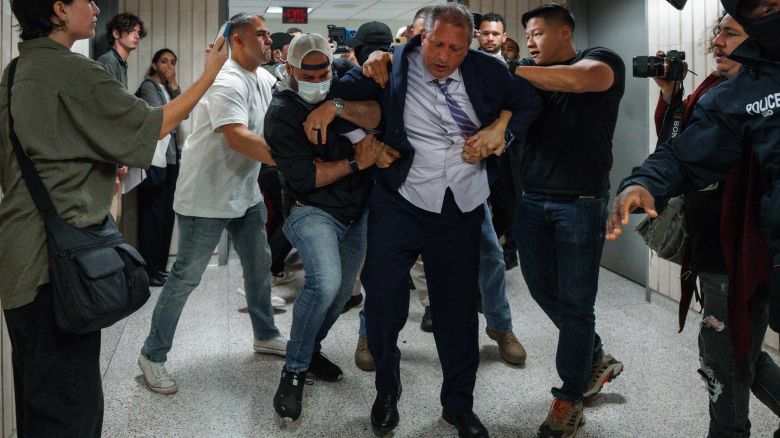 New York City Comptroller Brad Lander is placed under arrest by Immigration and Customs Enforcement (ICE) and FBI agents outside federal immigration court on Tuesday, June 17, 2025, in New York.
