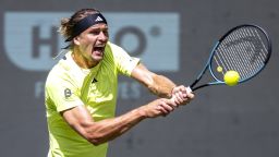 Germany's Alexander Zverev returns the ball to USA's Marcos Giron during the Halle ATP tennis tournament in Halle, Germany, Wednesday, June 18, 2025. (David Inderlied/dpa via AP)