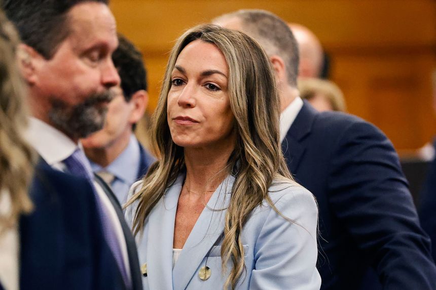 Karen Read watches jurors enter the courtroom to resume deliberations during her trial at Norfolk Superior Court, Wednesday, June 18, 2025, in Dedham, Massachusetts.