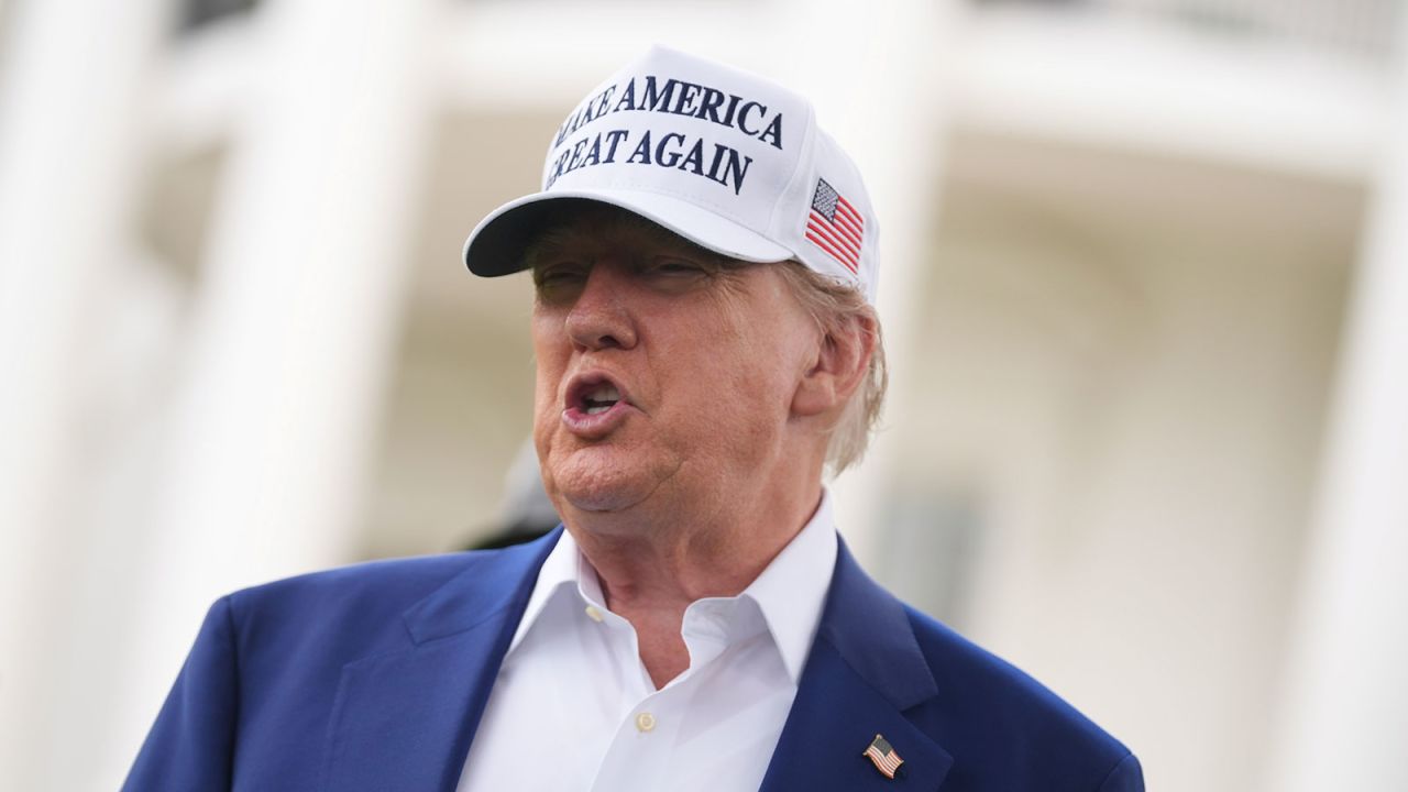 President Donald Trump speaks as a flag pole is installed on the South Lawn of the White House, Wednesday, June 18, 2025.