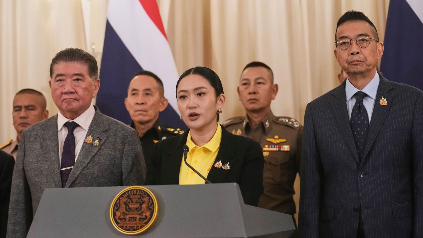 Thailand's Prime Minister Paetongtarn Shinawatra, center, talks to reporters at Government house in Bangkok, Thailand, on June 19, 2025.