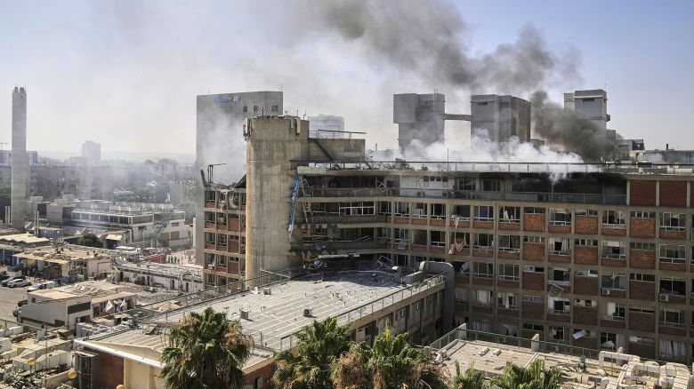 Smokes raises from a building of the Soroka hospital complex after it was hit by a missile fired from Iran in Be'er Sheva, Israel, Thursday, June 19, 2025. (AP Photo/Leo Correa)