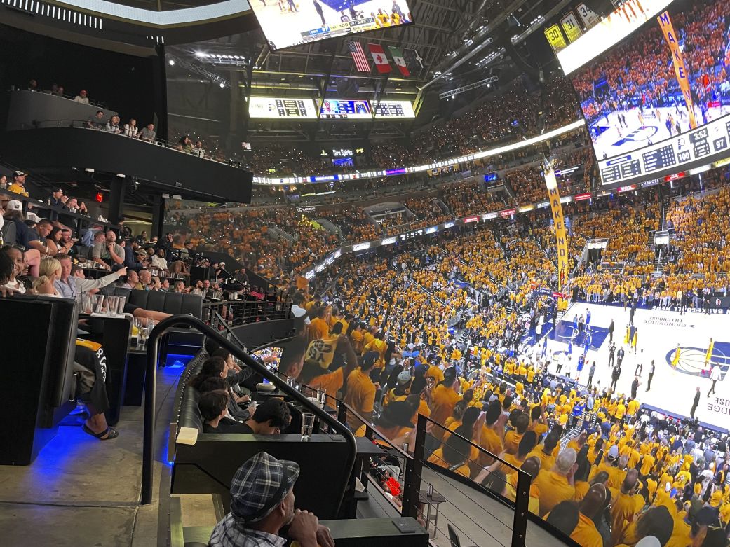 Fans watch the NBA Finals from Cosm Los Angeles in Inglewood, California, in June. The game was being played in Indianapolis.