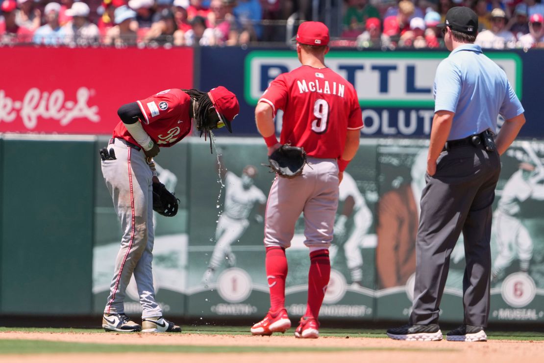 Cincinnati Reds shortstop Elly De La Cruz vomits during the fourth inning at Busch Stadium.