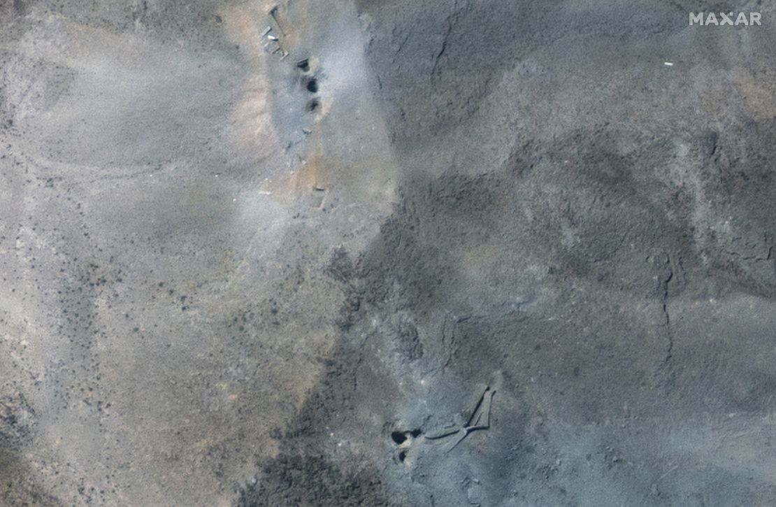 This satellite image provided by Maxar Technologies shows a close-up view of holes and craters on a ridge at the Fordow enrichment facility in Iran after US strikes, Sunday, June 22, 2025.