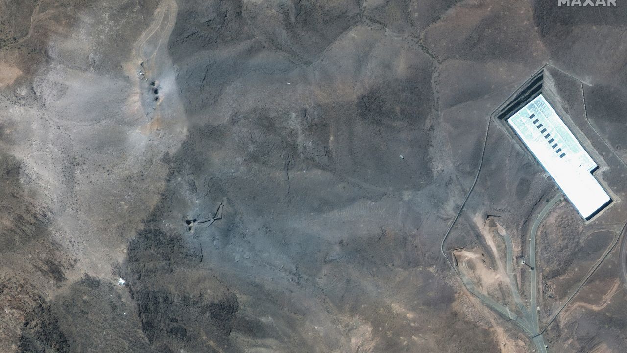 This satellite image provided by Maxar Technologies shows a closer view of craters and ash on a ridge at Fordow enrichment facility in Iran after US strikes, Sunday, June 22, 2025.