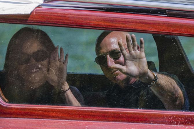 Sanchez and Bezos arrive by boat at a hotel in Venice on Wednesday, June 25.