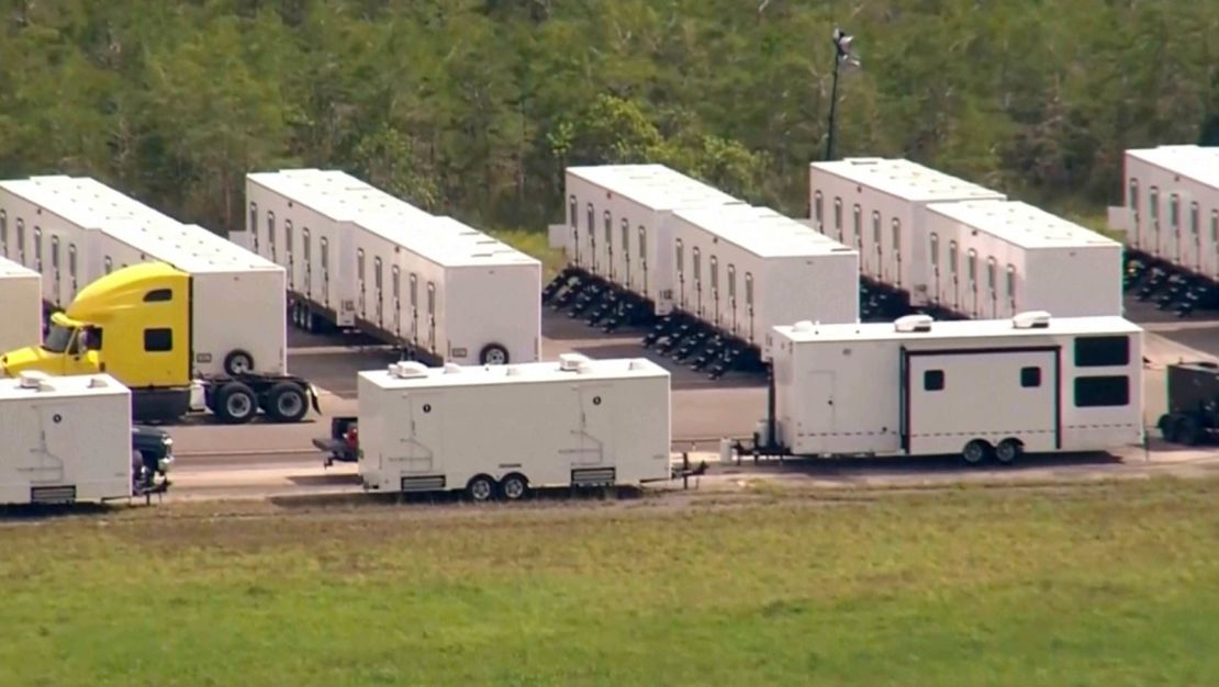 This image grab from video shows activity at an immigration detention facility dubbed “Alligator Alcatraz” located at an isolated Everglades airfield.