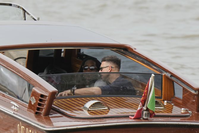 US talk show host Oprah Winfrey takes a taxi boat in Venice on Thursday.