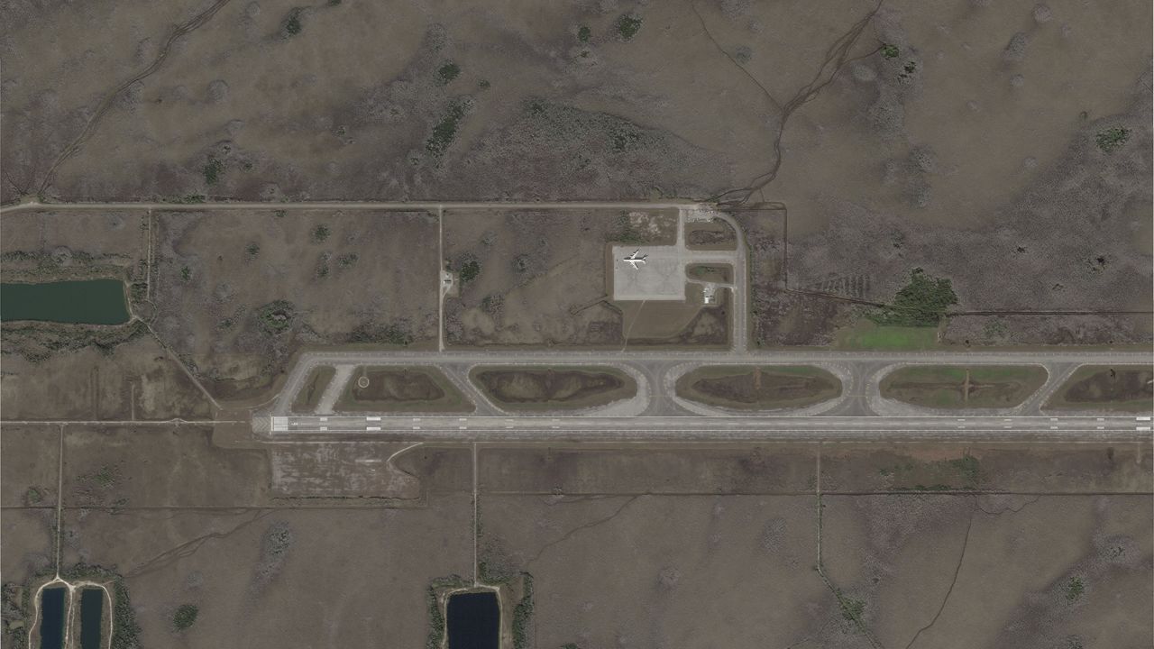 This satellite photo captured by Planet Labs PBC on Feb. 14, 2024, shows an airstrip in Ochopee, Fla., in the Everglades, more than a year before state officials began constructing a state immigration detention facility. (Planet Labs PBC via AP)