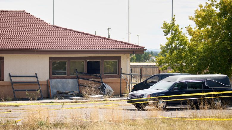 FILE - A hearse and van sit outside the Return to Nature Funeral Home in Penrose, Colo., on Oct. 6, 2023. (AP Photo/David Zalubowski, File)