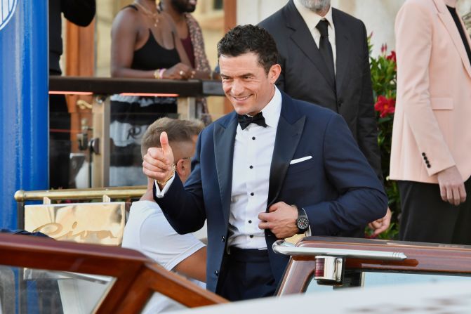 Orlando Bloom leaves his hotel for the wedding ceremony on Friday.