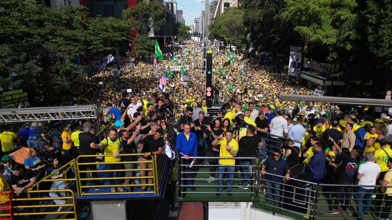 Brazil ex-leader Bolsonaro rallies thousands of supporters to protest his trial over alleged plot to overturn election