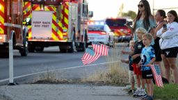 A procession from Kootenai Health headed to Spokane after two firefighters were killed on Sunday.