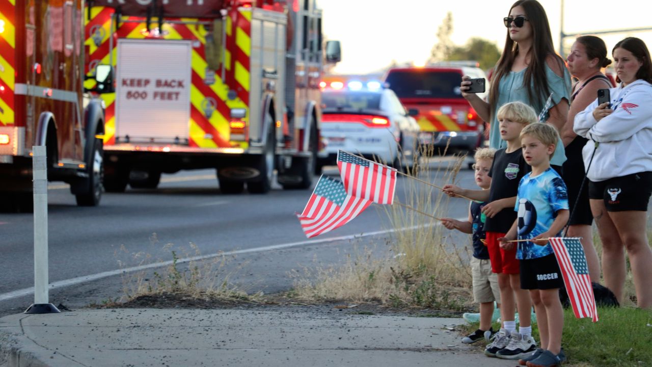 A procession from Kootenai Health headed to Spokane after two firefighters were killed on Sunday.