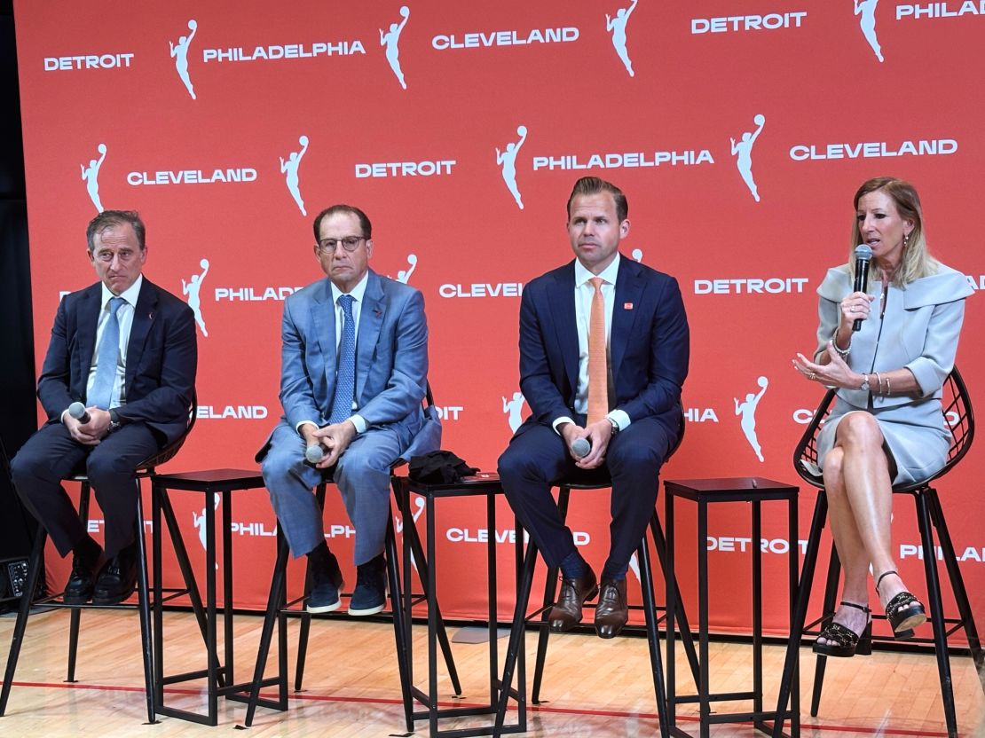 WNBA commissioner Cathy Engelbert (right) announces the three new WNBA teams alongside Nic Barlage (second right), representing the Cleveland Cavaliers, Arn Tellem (second left), Detroit Pistons vice-chairman, and Josh Harris (left), managing partner of the Philadelphia 76ers.