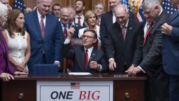 Speaker of the House Mike Johnson, R-La., center, celebrates with fellow Republicans after final passage of President Donald Trump's signature bill of tax breaks and spending cuts, at the Capitol in Washington, Thursday, July 3, 2025. (AP Photo/J. Scott Applewhite)