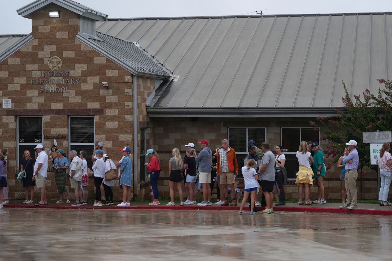 Families line up at the reunification center.
