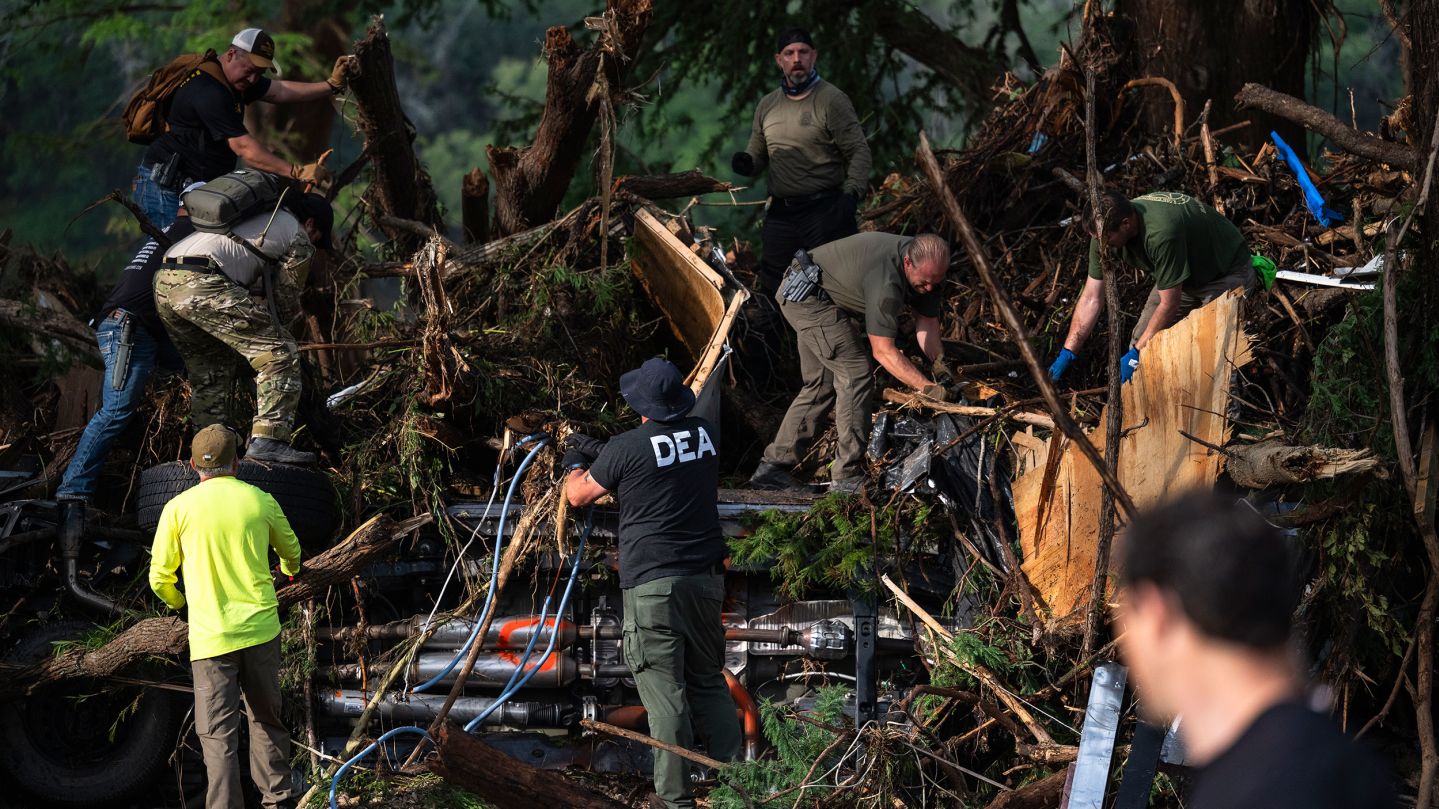 First responders carry out search and rescue operations near the Guadalupe River after a flash flood swept through the area Monday, July 7, 2025, in Ingram, Texas. (AP Photo/Eli Hartman)