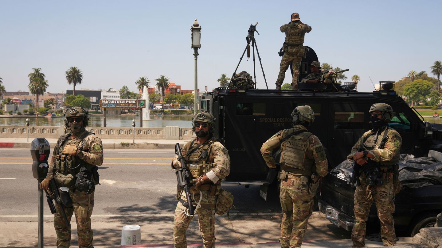 Federal agents stage at MacArthur Park in Los Angeles on July 7, 2025.