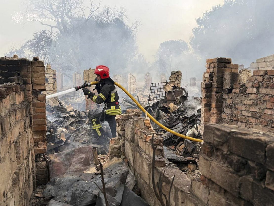 Firefighters on the scene following a Russian attack in Zhytomyr region, Ukraine, on Wednesday